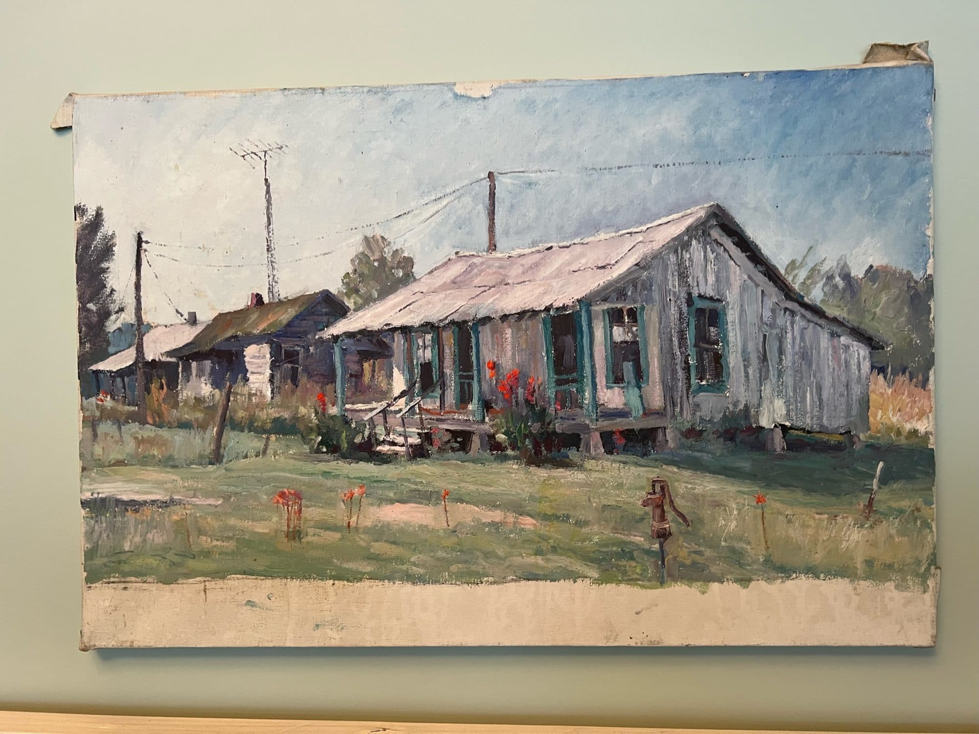 Weathered Shacks With Tin Roofs