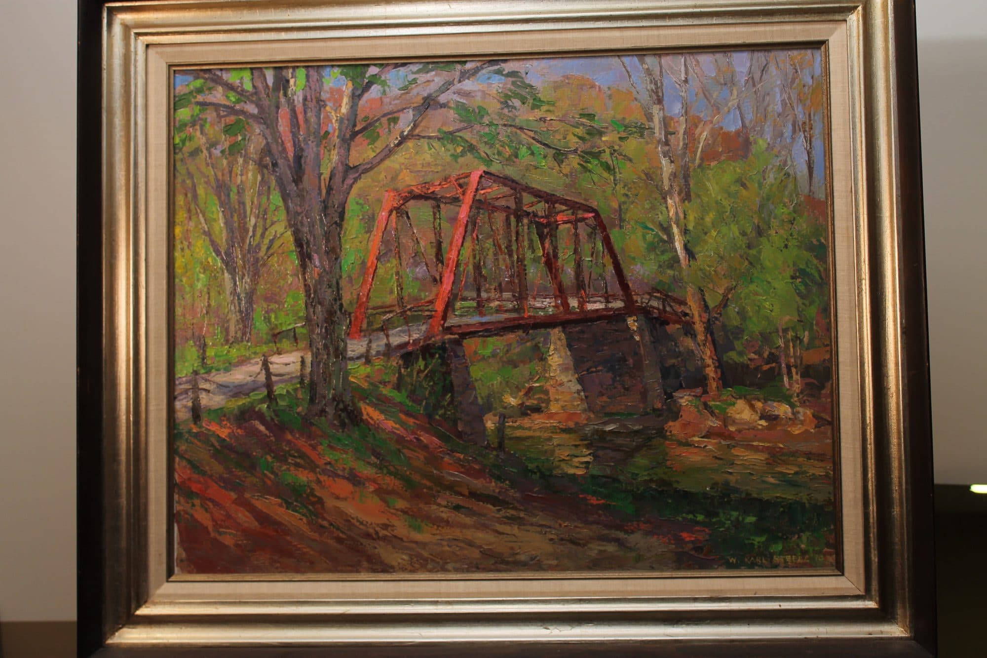 Red Truss Bridge In Autumn Woods